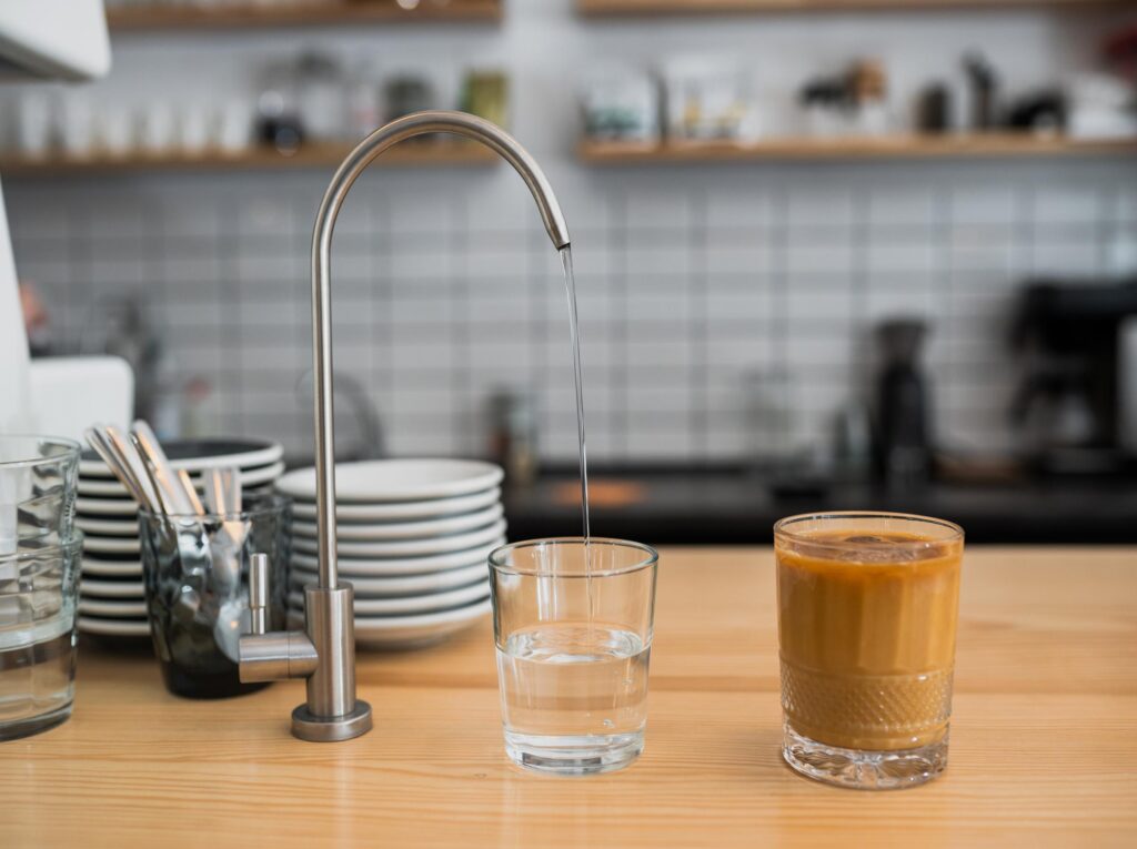kitchen-countertop-sink-with-dishes, common Water Dispenser Problems & Instant Heating Fixes